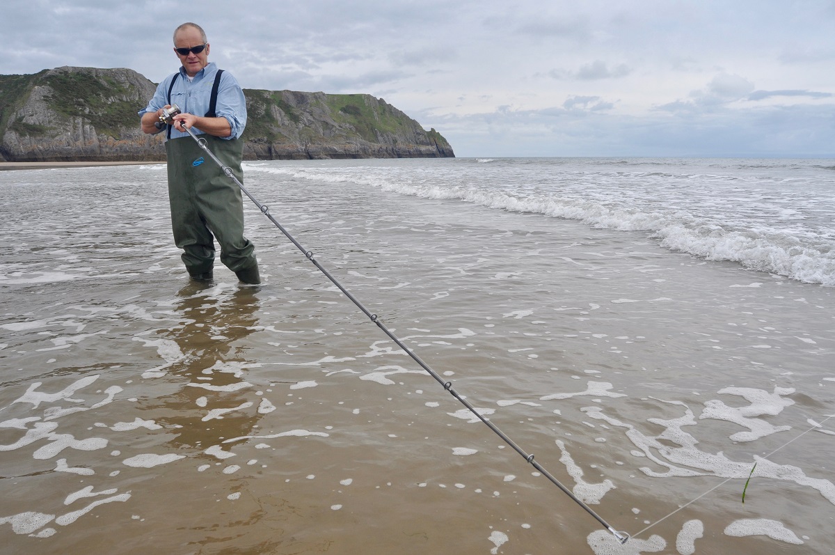 Sandy beach fishing in Wales